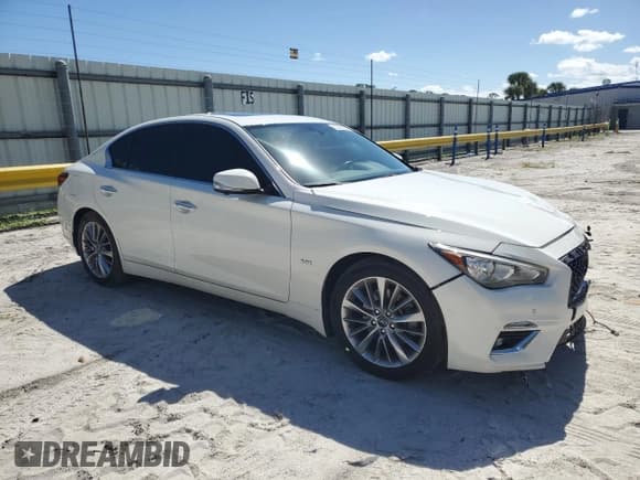 ✅ 2020 Infiniti Q50 Luxe • VIN: JN1EV7AP0LM205023 • Lot: 82580325. Listed on Copart with 96,883 mi. Free auction sales archive from the USA and detailed vehicle history report at DreamBid. Image 4.