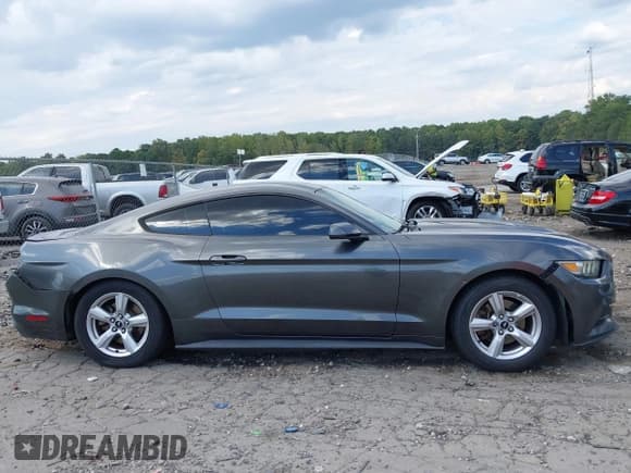 ✅ 2015 Ford Mustang V6 • VIN: 1FA6P8AM8F5395603 • Lot: 43297736. Listed on IAAI with 127,921 mi. Free auction sales archive from the USA and detailed vehicle history report at DreamBid. Image 13.