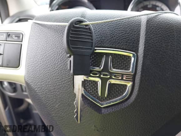 2015 Dodge Grand Caravan American Value с VIN 2C4RDGBGXFR631030, выставлен на аукционе IAAI как лот 43466266 с пробегом 156 931 миль миль и . История ставок и продаж доступна на DreamBid. Изображение 11.