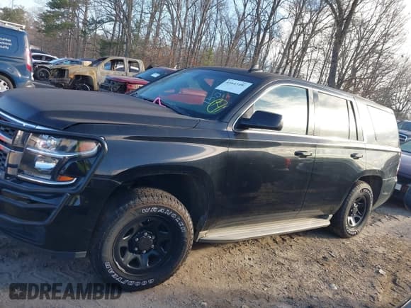 ✅ 2015 Chevrolet Tahoe Commercial • VIN: 1GNLC2EC4FR535329 • Lot: 41643486. Listed on IAAI with 185,326 mi. Free auction sales archive from the USA and detailed vehicle history report at DreamBid. Image 14.