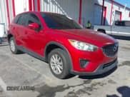 ✅ 2015 Mazda CX-5 Sport • VIN: JM3KE2BE6F0500131 • Lot: 43784489. Listed on IAAI with 149,701 mi. Free auction sales archive from the USA and detailed vehicle history report at DreamBid. Image 1.