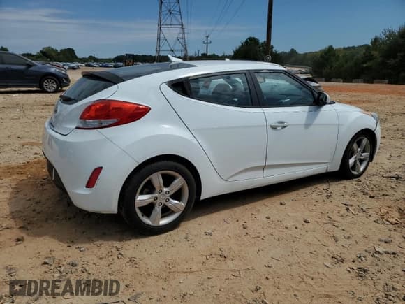 ✅ 2013 Hyundai Veloster w/Gray Int • VIN: KMHTC6AD5DU149023 • Lot: 71469355. Listed on Copart with 151,998 mi. Free auction sales archive from the USA and detailed vehicle history report at DreamBid. Image 3.