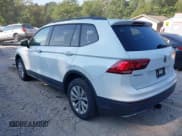 ✅ 2018 Volkswagen Tiguan S • VIN: 3VV0B7AX6JM119959 • Lot: 42967527. Listed on IAAI with 140,935 mi. Free auction sales archive from the USA and detailed vehicle history report at DreamBid. Image 3.