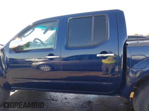 ✅ 2006 Nissan Frontier SE • VIN: 1N6AD07W56C433031 • Lot: 41382847. Listed on IAAI with 80,576 mi. Free auction sales archive from the USA and detailed vehicle history report at DreamBid. Image 14.