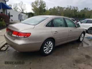 2007 Hyundai Azera SE z VIN KMHFC46F87A175262, wystawiony jako Copart lot #73423154 z przebiegiem 38 826 mil mil oraz Nie do naprawy • Non repairable. Historia ofert i sprzedaży dostępna na DreamBid. Obrazek 3.