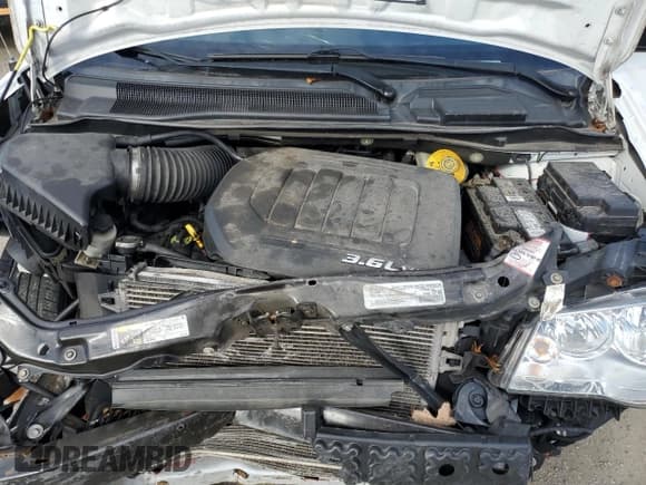 ✅ 2018 Dodge Grand Caravan SE • VIN: 2C4RDGBGXJR363377 • Lot: 86991245. Wystawiony na Copart z przebiegiem 112 803 mil. Bezpłatny archiwum sprzedaży aukcyjnych z USA i szczegółowy raport historii pojazdu na DreamBid. Zdjęcie 12.