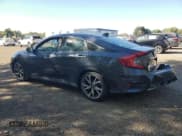 ✅ 2019 Honda Civic Touring • VIN: 2HGFC1F94KH101815 • Лот: 71849705. Опубликован ранее на Copart с пробегом 141 631 миль. Бесплатный доступ к архиву аукционных продаж из США и подробный отчёт об истории автомобиля на DreamBid. Изображение 2.