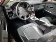 ✅ 2004 Chrysler Crossfire • VIN: 1C3AN69L64X016159 • Lot: 73924774. Listed on Copart with 106,570 mi. Free auction sales archive from the USA and detailed vehicle history report at DreamBid. Image 8.