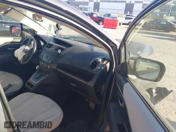 ✅ 2012 Mazda 5 Touring • VIN: JM1CW2CL6C0141592 • Lot: 43641687. Wystawiony na IAAI z przebiegiem 191 938 mil. Bezpłatny archiwum sprzedaży aukcyjnych z USA i szczegółowy raport historii pojazdu na DreamBid. Zdjęcie 5.