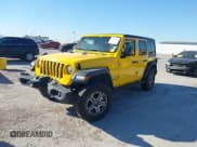 ✅ 2021 Jeep Wrangler Unlimited Willys • VIN: 1C4HJXDG4MW532399 • Лот: 41833236. Опубликован ранее на IAAI с пробегом 64 627 миль. Бесплатный доступ к архиву аукционных продаж из США и подробный отчёт об истории автомобиля на DreamBid. Изображение 2.