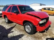 ✅ 1999 Chevrolet Blazer LS • VIN: 1GNCT18W7XK100976 • Lot: 74916084. Listed on Copart with 164,183 mi. Free auction sales archive from the USA and detailed vehicle history report at DreamBid. Image 4.