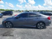 ✅ 2017 Honda Civic EX-T • VIN: 2HGFC1F34HH640486 • Lot: 43007728. Listed on IAAI with 132,879 mi. Free auction sales archive from the USA and detailed vehicle history report at DreamBid. Image 14.