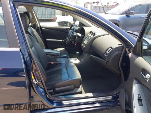 ✅ 2007 Nissan Altima SE • VIN: 1N4BL21EX7C232416 • Lot: 42575433. Listed on IAAI with 142,828 mi. Free auction sales archive from the USA and detailed vehicle history report at DreamBid. Image 5.