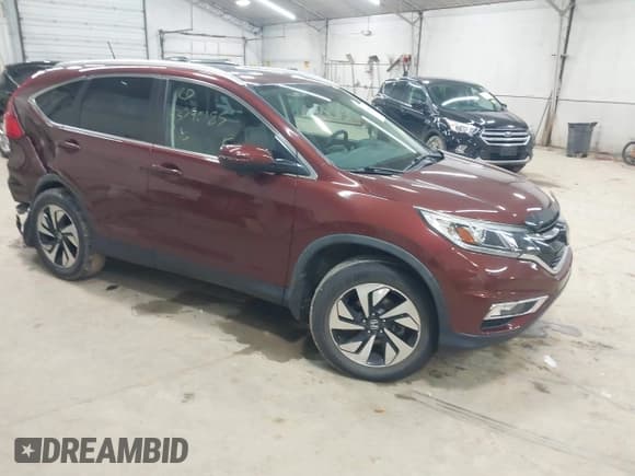 ✅ 2016 Honda CR-V Touring • VIN: 5J6RM4H99GL088409 • Lot: 43590185. Listed on IAAI with 54,499 mi. Free auction sales archive from the USA and detailed vehicle history report at DreamBid. Image 1.