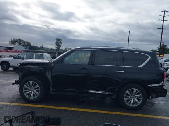 ✅ 2016 Infiniti QX80 • VIN: JN8AZ2ND9G9800484 • Lot: 43768514. Wystawiony na IAAI z przebiegiem 132 976 mil. Bezpłatny archiwum sprzedaży aukcyjnych z USA i szczegółowy raport historii pojazdu na DreamBid. Zdjęcie 15.