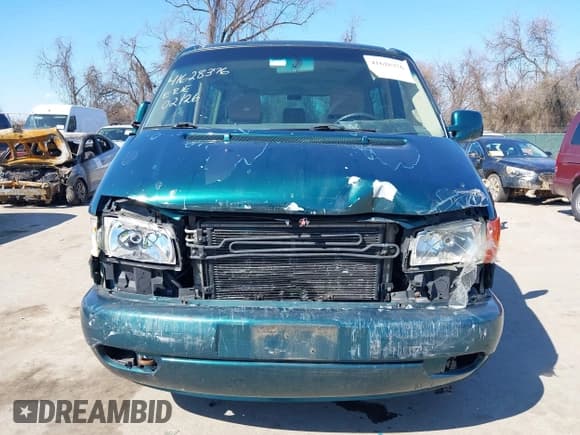 ✅ 2002 Volkswagen EuroVan GLS • VIN: WV2KB47002H029567 • Lot: 41628376. Listed on IAAI with 156,866 mi. Free auction sales archive from the USA and detailed vehicle history report at DreamBid. Image 6.