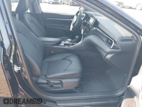 2023 Toyota Camry SE with VIN 4T1G11BKXPU097643, listed as a IAAI auction lot 42833306 with 23,580 mi miles and . Bid and sale history available at DreamBid. Image 5.