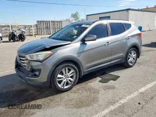 2013 Hyundai Santa Fe Sport z VIN 5XYZU3LA6DG047728, wystawiony jako Copart lot #70909625 z przebiegiem 175 658 mil mil oraz Szkoda całkowita • Salvage title. Historia ofert i sprzedaży dostępna na DreamBid. Obrazek 1.