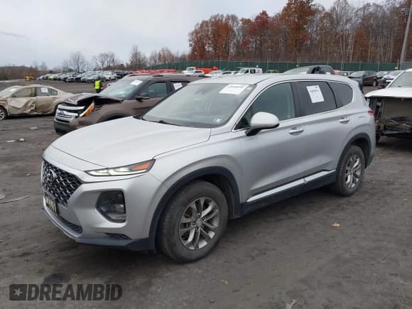 ✅ 2019 Hyundai Santa Fe SE • VIN: 5NMS2CAD7KH054274 • Lot: 43694931. Listed on IAAI with 96,329 mi. Free auction sales archive from the USA and detailed vehicle history report at DreamBid. Image 2.