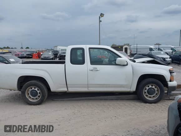 2012 Chevrolet Colorado Work Truck with VIN 1GCESBF99C8161891, listed as a IAAI auction lot 43005636 with 144,193 mi miles and . Bid and sale history available at DreamBid. Image 13.