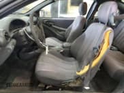 ✅ 2004 Pontiac Sunfire • VIN: 1G2JB12F147295892 • Lot: 56635135. Wystawiony na Copart z przebiegiem 171 121 mil. Bezpłatny archiwum sprzedaży aukcyjnych z USA i szczegółowy raport historii pojazdu na DreamBid. Zdjęcie 7.