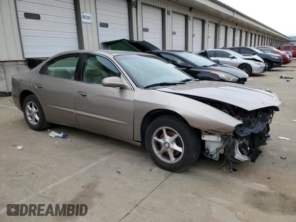 ✅ 2002 Oldsmobile Aurora • VIN: 1G3GR64H224169066 • Лот: 44636565. Опубликован ранее на Copart с пробегом 69 419 миль. Бесплатный доступ к архиву аукционных продаж из США и подробный отчёт об истории автомобиля на DreamBid. Изображение 4.