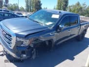 ✅ 2022 GMC Sierra 1500 SLT • VIN: 1GTU9DELONZ219903 • Lot: 40140320. Listed on IAAI with 57,019 mi. Free auction sales archive from the USA and detailed vehicle history report at DreamBid. Image 2.