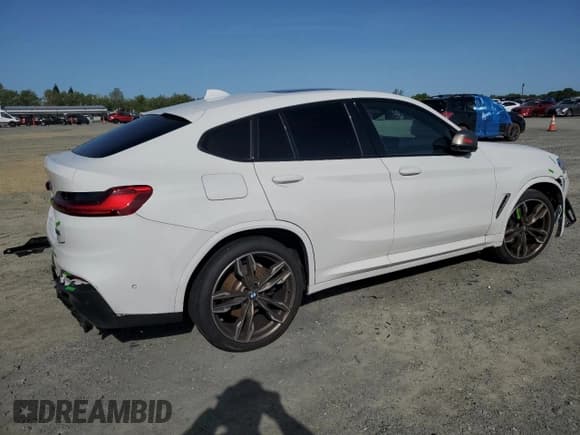 ✅ 2020 BMW X4 M40i • VIN: 5UX2V5C08L9B49129 • Lot: 52085885. Listed on Copart with 51,368 mi. Free auction sales archive from the USA and detailed vehicle history report at DreamBid. Image 3.
