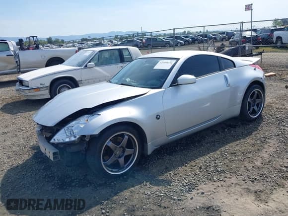 ✅ 2006 Nissan 350Z Touring • VIN: JN1AZ34DX6M302361 • Лот: 42109674. Опубликован ранее на IAAI с пробегом 154 214 миль. Бесплатный доступ к архиву аукционных продаж из США и подробный отчёт об истории автомобиля на DreamBid. Изображение 18.