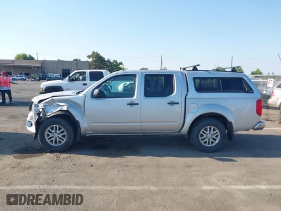 ✅ 2016 Nissan Frontier Pro-4X • VIN: 1N6AD0EV4GN771911 • Lot: 42955470. Listed on IAAI with 113,355 mi. Free auction sales archive from the USA and detailed vehicle history report at DreamBid. Image 14.