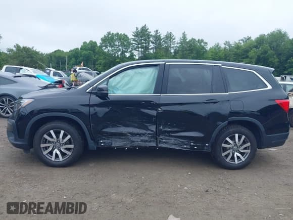✅ 2019 Honda Pilot EX-L • VIN: 5FNYF6H51KB061852 • Лот: 42501422. Опубликован ранее на IAAI с пробегом 95 258 миль. Бесплатный доступ к архиву аукционных продаж из США и подробный отчёт об истории автомобиля на DreamBid. Изображение 14.