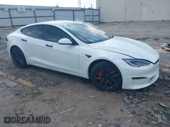 ✅ 2023 Tesla Model S Plaid • VIN: 5YJSA1E63PF521945 • Lot: 43248046. Listed on IAAI with 26,327 mi. Free auction sales archive from the USA and detailed vehicle history report at DreamBid. Image 1.