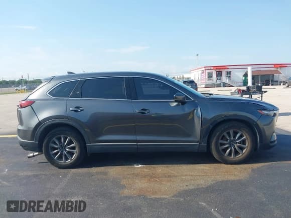 ✅ 2021 Mazda CX-9 Touring • VIN: JM3TCACYXM0511613 • Lot: 42294802. Listed on IAAI with 49,105 mi. Free auction sales archive from the USA and detailed vehicle history report at DreamBid. Image 13.