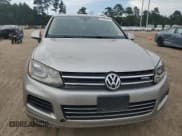 ✅ 2012 Volkswagen Touareg • VIN: WVGEG9BP0CD008849 • Lot: 68694975. Listed on Copart with Not provided. Free auction sales archive from the USA and detailed vehicle history report at DreamBid. Image 5.