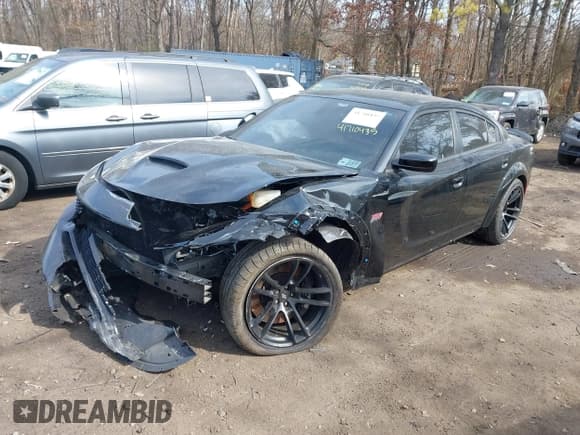 ✅ 2023 Dodge Charger Scat Pack Widebody • VIN: 2C3CDXGJXPH539485 • Lot: 41710435. Listed on IAAI with 27,078 mi. Free auction sales archive from the USA and detailed vehicle history report at DreamBid. Image 2.