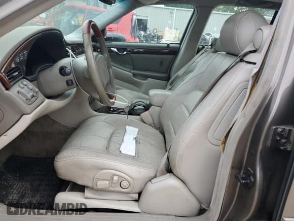 ✅ 2000 Cadillac DeVille • VIN: 1G6KF5794YU249059 • Lot: 71614494. Listed on Copart with 121,611 mi. Free auction sales archive from the USA and detailed vehicle history report at DreamBid. Image 7.