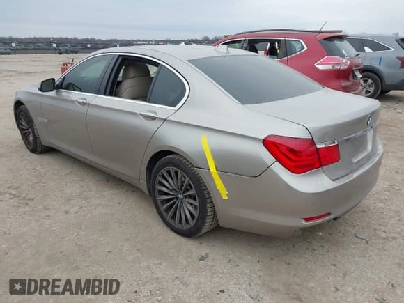 ✅ 2012 BMW 7 Series 740i • VIN: WBAKA4C51CC613670 • Lot: 41582639. Listed on IAAI with 149,753 mi. Free auction sales archive from the USA and detailed vehicle history report at DreamBid. Image 3.