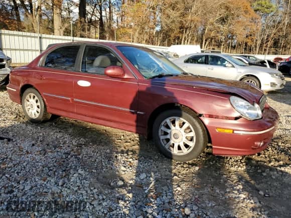 2003 Hyundai Sonata GLS с VIN KMHWF35H63A904633, выставлен на аукционе Copart как лот 85715484 с пробегом 107 556 миль миль и Списание • Salvage title. История ставок и продаж доступна на DreamBid. Изображение 4.