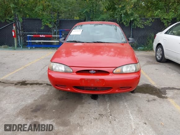 ✅ 2000 Ford Escort • VIN: 3FAFP13P2YR167076 • Лот: 43229335. Опубликован ранее на IAAI с пробегом 308 625 миль. Бесплатный доступ к архиву аукционных продаж из США и подробный отчёт об истории автомобиля на DreamBid. Изображение 6.