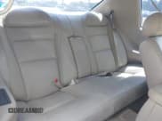 ✅ 2001 Cadillac Eldorado ESC • VIN: 1G6EL12Y31B107932 • Lot: 42723296. Wystawiony na IAAI z przebiegiem 152 482 mil. Bezpłatny archiwum sprzedaży aukcyjnych z USA i szczegółowy raport historii pojazdu na DreamBid. Zdjęcie 8.