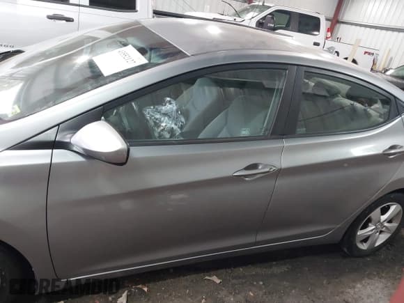 ✅ 2012 Hyundai Elantra GLS • VIN: KMHDH4AE8CU184818 • Lot: 43552127. Listed on IAAI with 157,000 mi. Free auction sales archive from the USA and detailed vehicle history report at DreamBid. Image 14.