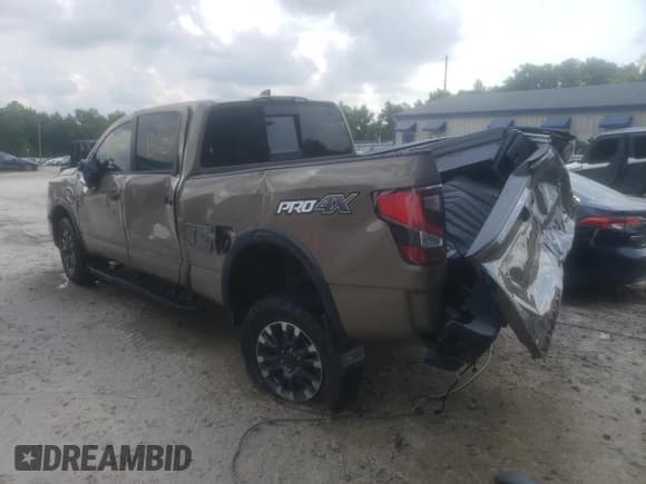 ✅ 2023 Nissan Titan Pro-4X • VIN: 1N6AA1FB4PN111502 • Lot: 60640414. Listed on Copart with 13,254 mi. Free auction sales archive from the USA and detailed vehicle history report at DreamBid. Image 2.