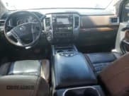 ✅ 2018 Nissan Titan Platinum Reserve • VIN: 1N6BA1F48JN526755 • Lot: 64447055. Listed on Copart with 155,037 mi. Free auction sales archive from the USA and detailed vehicle history report at DreamBid. Image 8.