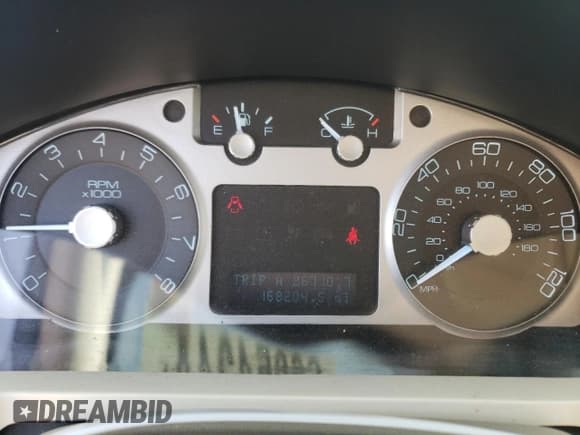 ✅ 2010 Mercury Mariner Premier • VIN: 4M2CN9HG7AKJ26845 • Lot: 66954244. Wystawiony na Copart z przebiegiem 168 204 mil. Bezpłatny archiwum sprzedaży aukcyjnych z USA i szczegółowy raport historii pojazdu na DreamBid. Zdjęcie 9.