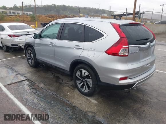 ✅ 2016 Honda CR-V Touring • VIN: 5J6RM3H90GL031090 • Lot: 43217183. Wystawiony na IAAI z przebiegiem 50 697 mil. Bezpłatny archiwum sprzedaży aukcyjnych z USA i szczegółowy raport historii pojazdu na DreamBid. Zdjęcie 3.
