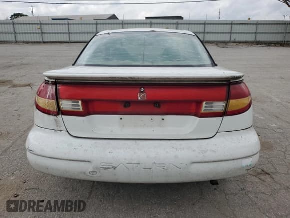 ✅ 1997 Saturn SC • VIN: 1G8ZF1282VZ133256 • Лот: 74026354. Опубликован ранее на Copart с пробегом 84 564 миль. Бесплатный доступ к архиву аукционных продаж из США и подробный отчёт об истории автомобиля на DreamBid. Изображение 6.