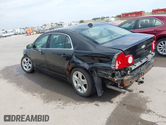 2012 Chevrolet Malibu 1LS z VIN 1G1ZB5E03CF253296, wystawiony jako IAAI lot #43278369 z przebiegiem 144 163 mil mil oraz . Historia ofert i sprzedaży dostępna na DreamBid. Obrazek 3.