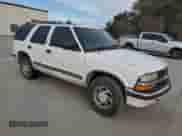 1999 Chevrolet Blazer LT с VIN 1GNDT13W1X2163194, выставлен на аукционе Copart как лот 82897414 с пробегом Не указан миль и Списание • Salvage title. История ставок и продаж доступна на DreamBid. Изображение 4.