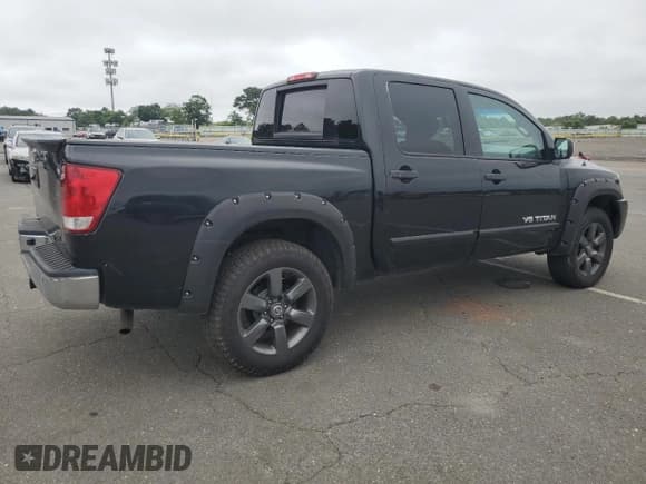✅ 2015 Nissan Titan SV • VIN: 1N6AA0EC2FN503980 • Lot: 64664665. Listed on Copart with 124,589 mi. Free auction sales archive from the USA and detailed vehicle history report at DreamBid. Image 3.