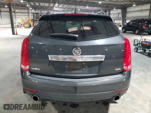 ✅ 2016 Cadillac SRX Luxury Collection • VIN: 3GYFNBE36GS569331 • Lot: 86246305. Wystawiony na Copart z przebiegiem 54 067 mil. Bezpłatny archiwum sprzedaży aukcyjnych z USA i szczegółowy raport historii pojazdu na DreamBid. Zdjęcie 6.